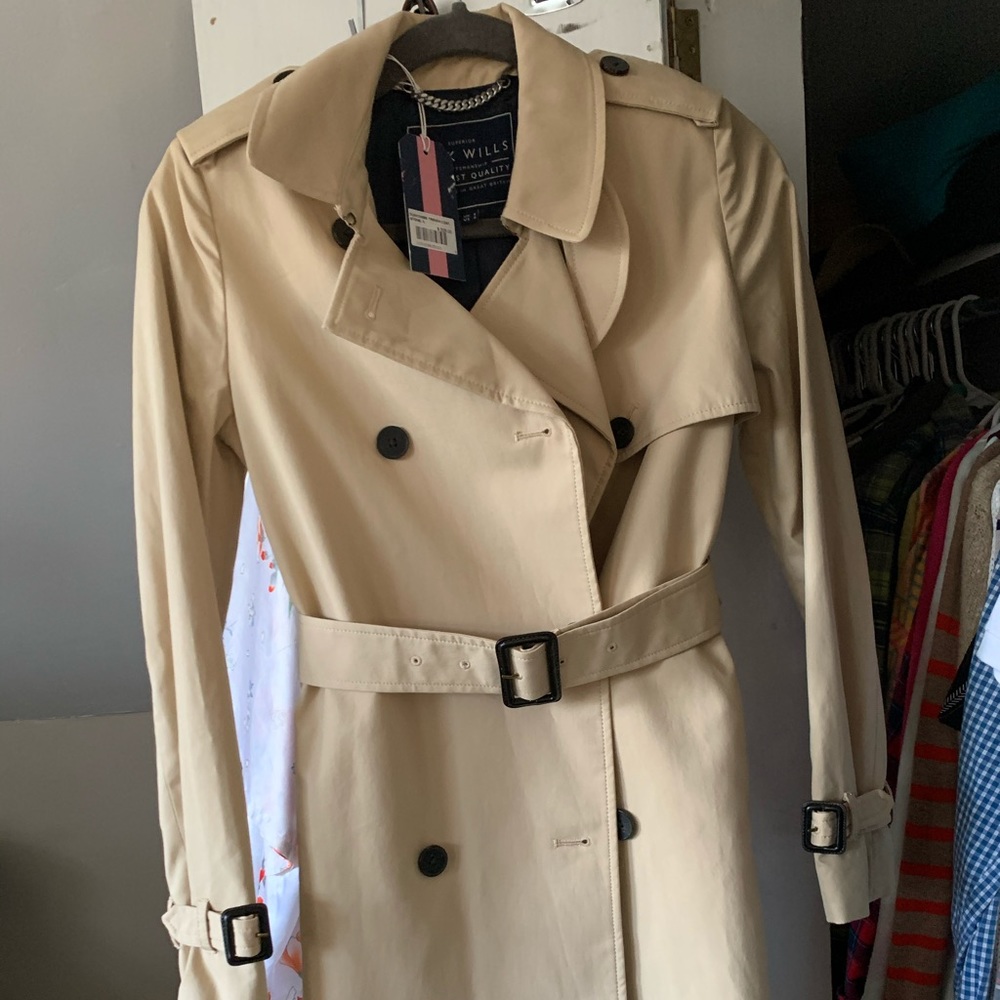 Khaki trench coat. Never been worn.